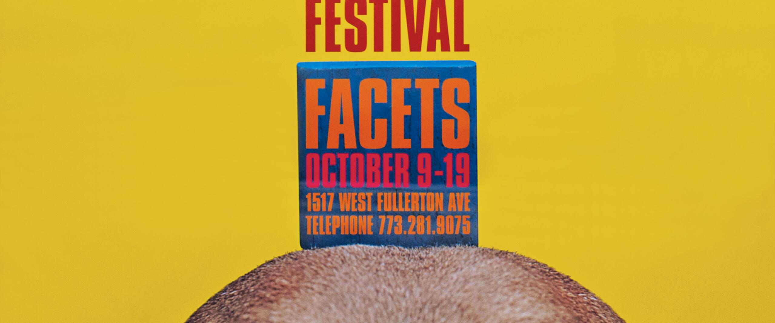 Film festival poster with a yellow background and colorful text about the 1997 Chicago International Children's Film Festival. The top of a dog's head with attentive eyes is visible at the bottom.
