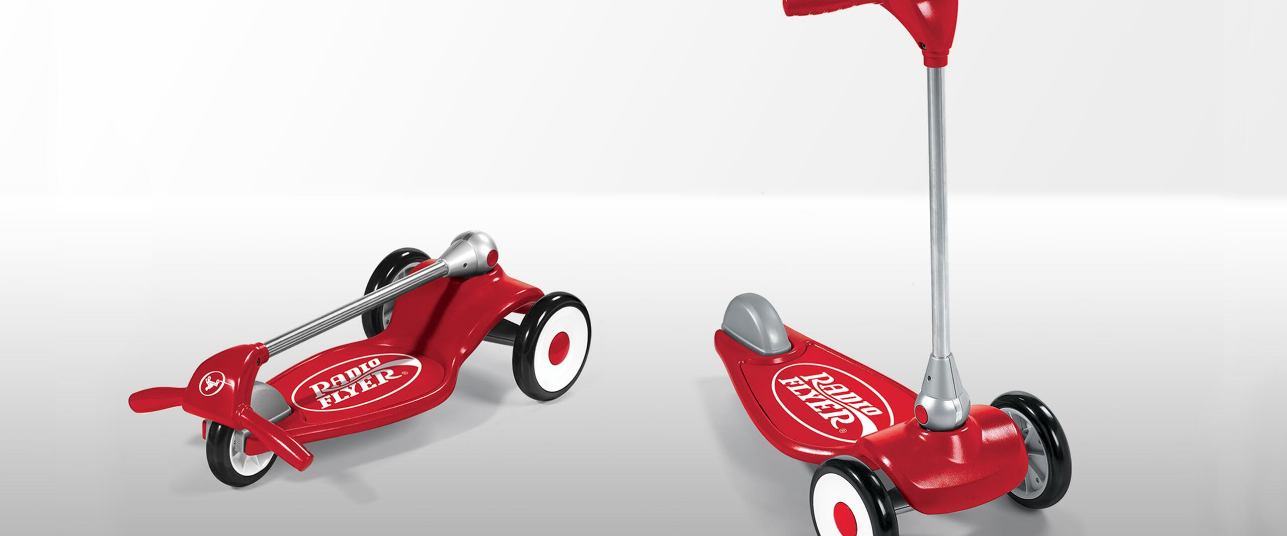Red Radio Flyer scooter in two positions; one collapsed flat, the other upright with red handlebars and three black-and-white wheels, on a light gray background.