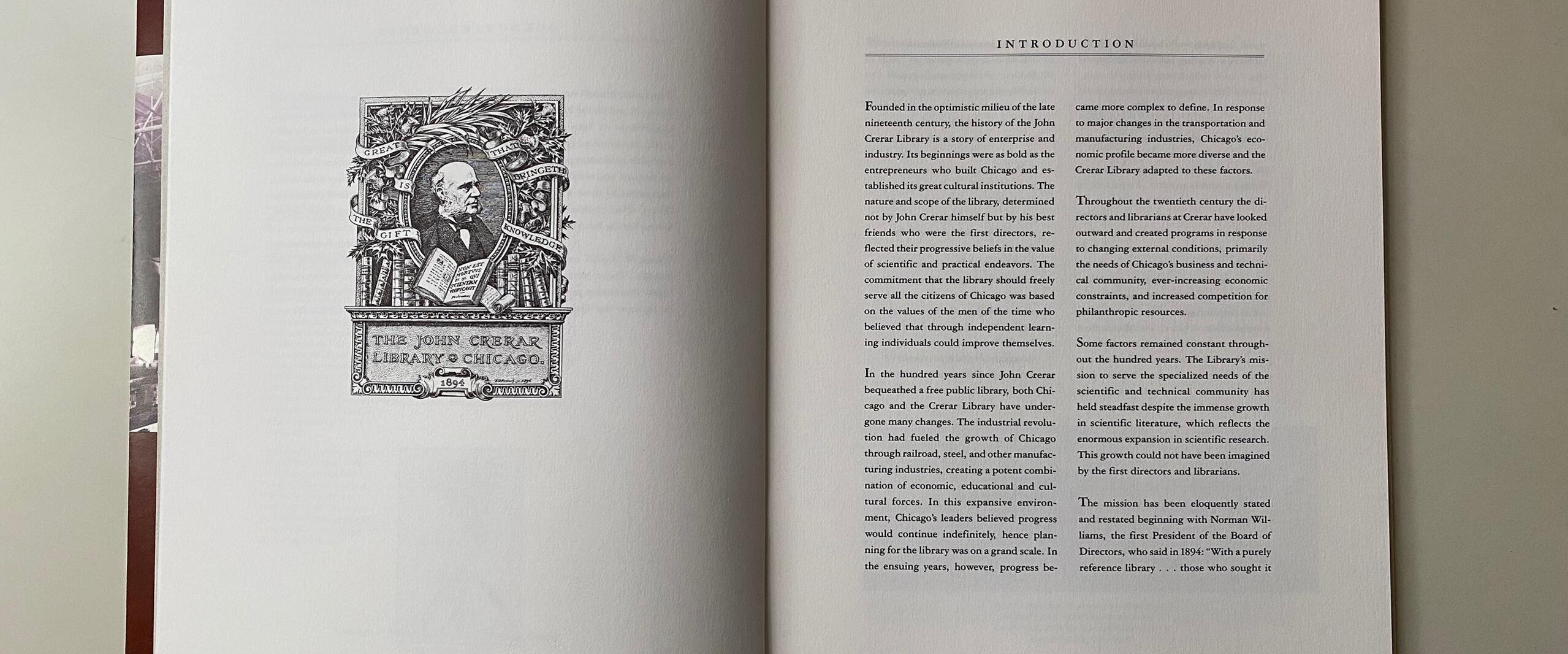 Open book showing a detailed illustration titled "The John Crerar Library of Chicago" on the left page and an "Introduction" text on the right. The book is laid open on a light surface.