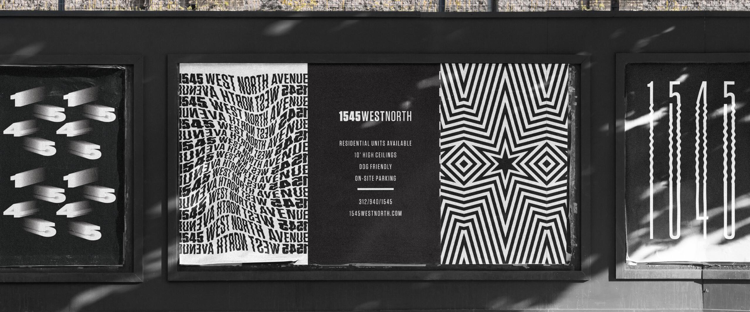 Graphic street art on a wall featuring various designs including distorted text, geometric patterns, and large numbers, under clear daylight with shadows cast on the pavement.