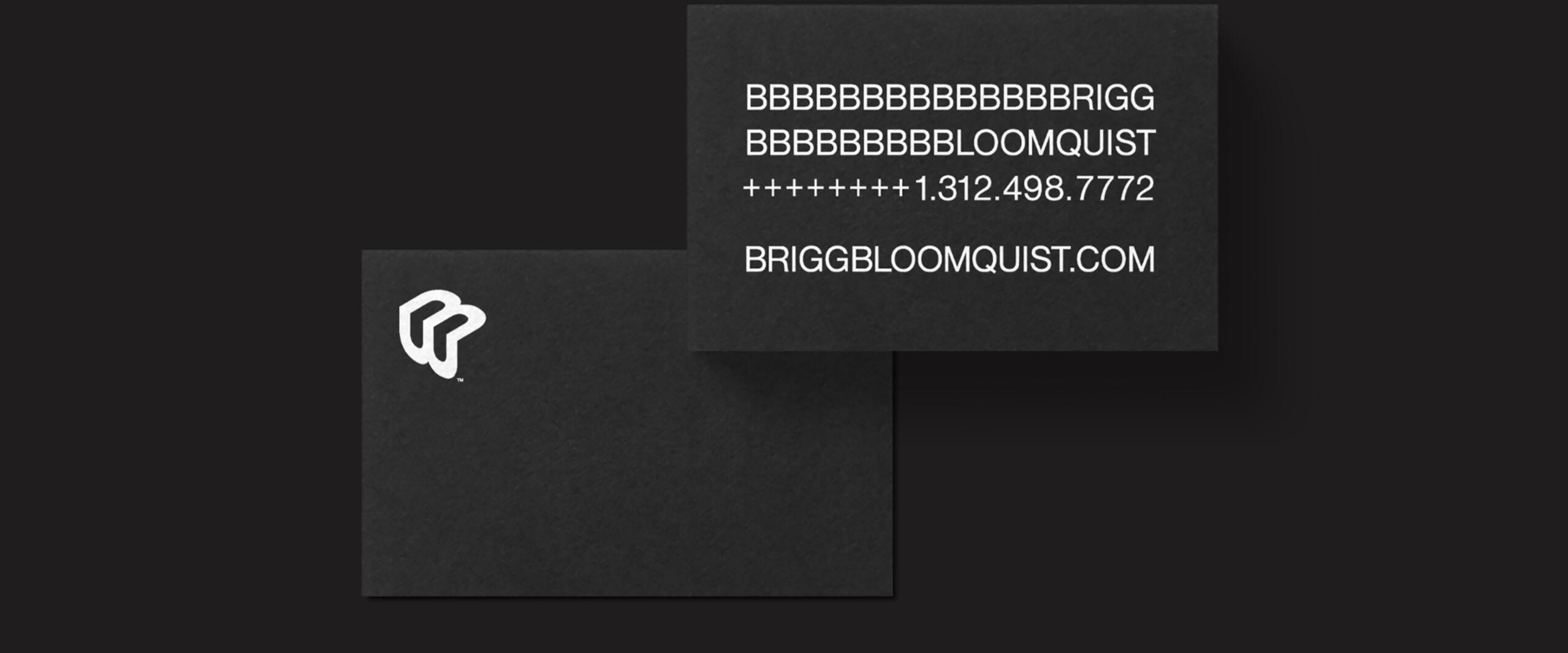Two black business cards against a dark background. The card on the left displays a stylized white logo, while the card on the right shows text with a name, phone number, and website in white.
