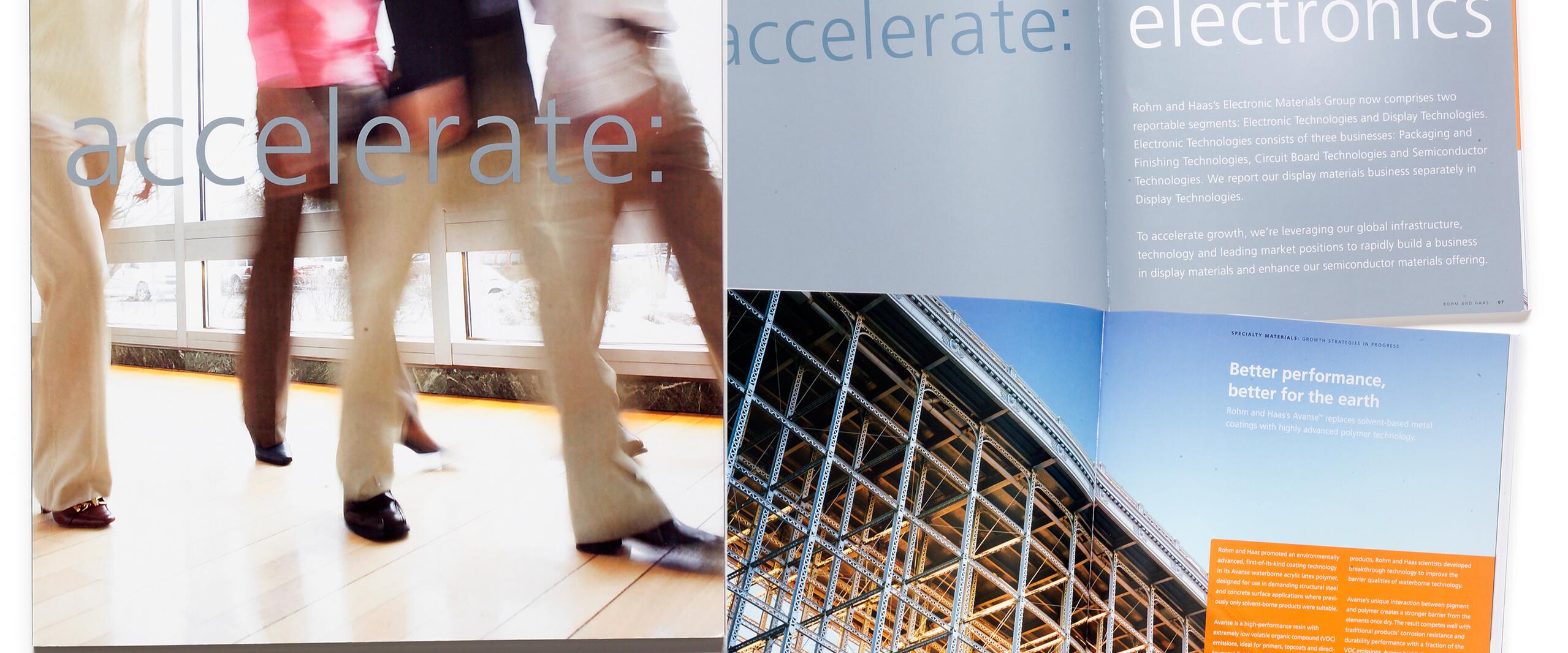 Blurry image of people walking past windows in a sunlit office; adjacent open magazine with text about electronics, showing a steel structure under a bright blue sky.