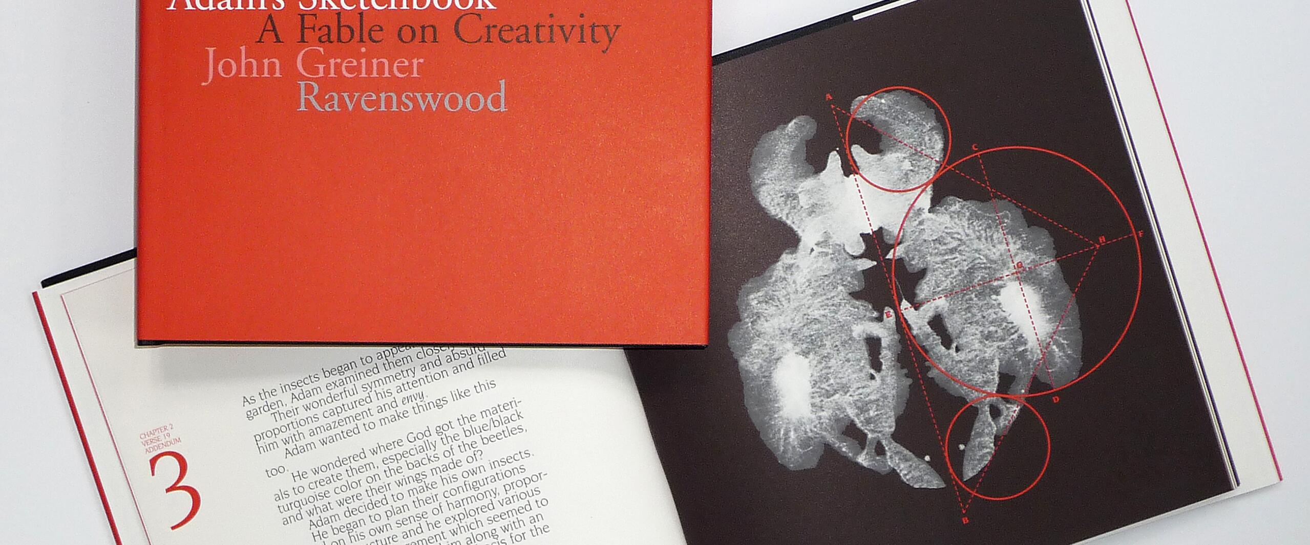 Red book titled "Adam's Sketchbook: A Fable on Creativity" by John Greiner Ravenswood, partially covering an open book. The open book shows text and an artistic black-and-white illustration with geometric red circles over it.