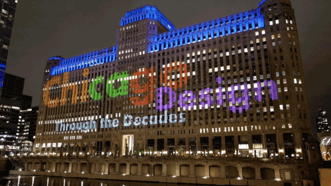 rotating gif of stills of the facade of the Merchandise Mart with projection mapping.